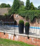 Iron gates around swimming pool
